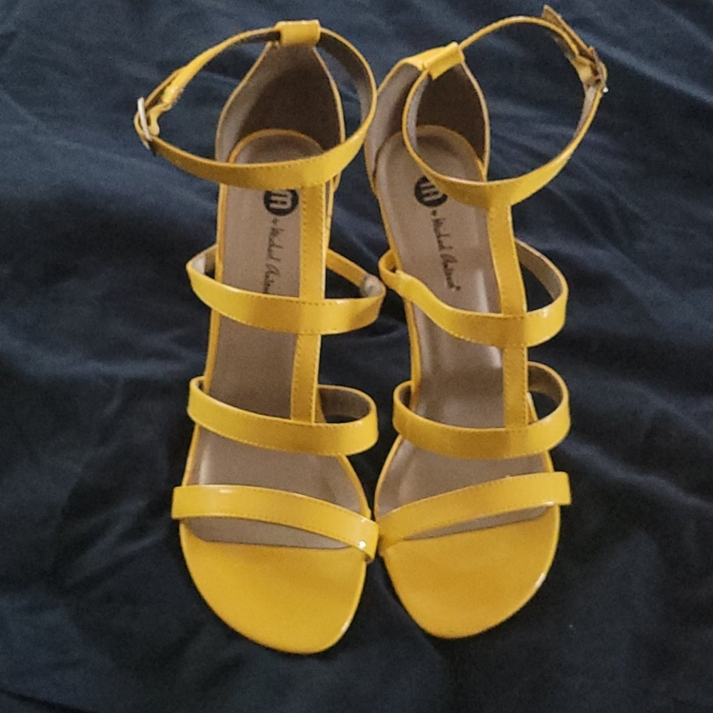 Beautiful yellow strappy sandals worn once.